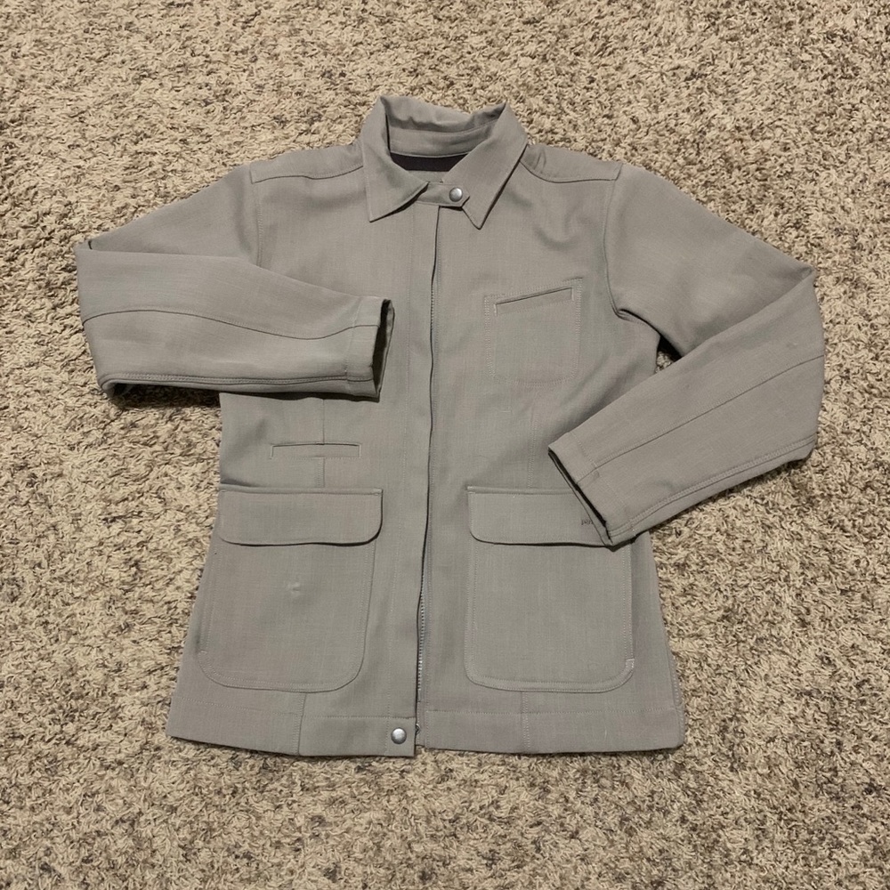 Patagonia women’s beige 4 pocket jacket